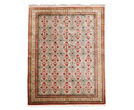 Very Fine Ghom Silk Carpet Central Iran, modernThe ivory lattice field of floral cartouches enclosed by borders of birds and 