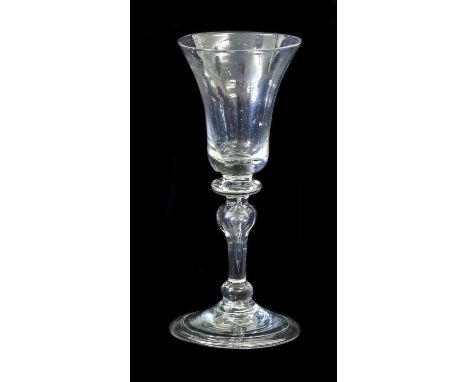 A Balustroid Wine Glass, circa 1740, the bell shaped bowl on a ball knop and baluster stem with air tear and basal ball knop 