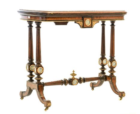 A Victorian Amboyna, Walnut and Gilt Metal-Mounted Foldover Card Table, circa 1880, the quarter-veneered and bone-inlaid top 