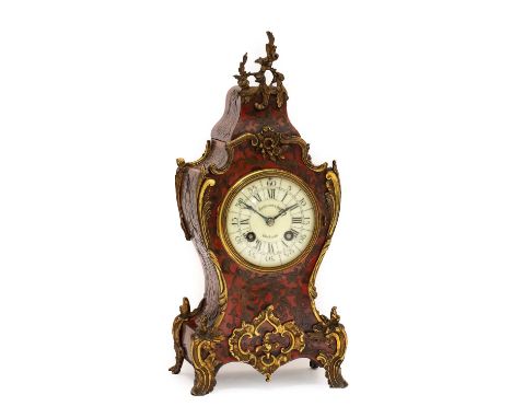 A French "Boulle" Striking Mantel Clock, retailed by Hamilton &amp; Inches, Edinburgh, circa 1890, the elaborate case with br