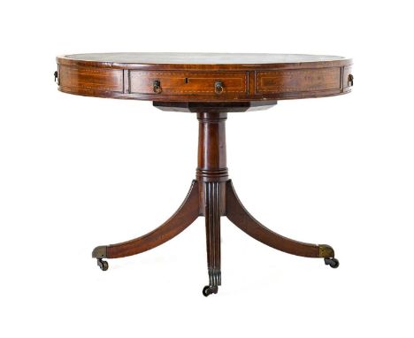 A Late Regency Mahogany and Barber's Pole Strung Library Drum Table, 2nd quarter 19th century, the black leather writing surf