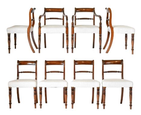 A Set of Eight (6+2) George IV Dining Chairs, circa 1820, recovered in cream geometric floral fabric, the reeded and curved t