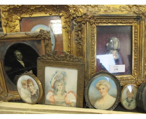 A collection of portrait miniatures and a framed silvered profile of a Georgian man  