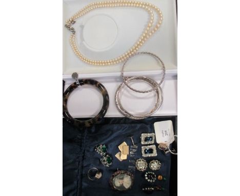 A quantity of jewellery to include a two strand graduated cultured pearl necklace, a 19th century foil backed amethyst and sp