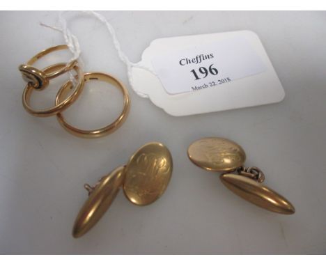 Two 22ct wedding bands (10.3g), a ring stamped 750 (2.2g) and a pair of 15ct cufflinks (7.7g)  