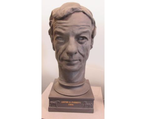 A limited edition Wedgwood black basalt bust of Lester Piggott OBE; A Royal Worcester blush ivory vase and cover and a bowl p