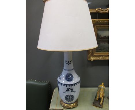 A ceramic lamp and shade  