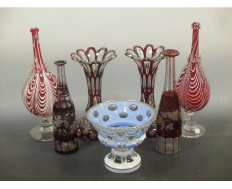 A pair of ruby glass lustres (lacking drops), decanters (lacking stoppers), Venetian style vases and a glass enamelled with f