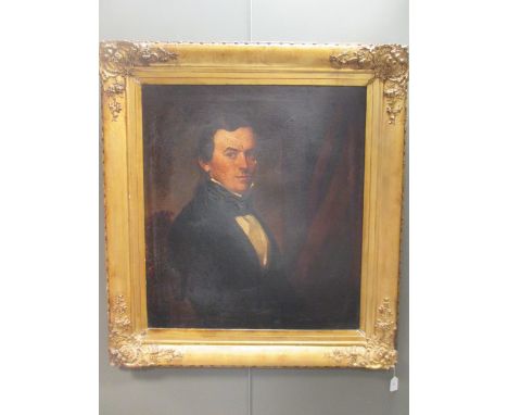 English School (19th century) Portrait of a gentleman, half length, seated weraing a black jacket, oil on canvas, 75 x 60cm. 