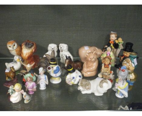 A quantity of Beswick, Doulton, Wade, Goebel, Poole, Coalport and other decorative figures  