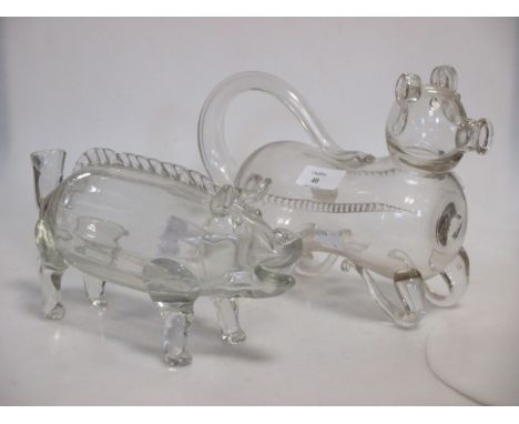 A glass decanter modelled as a bear and another modelled as a pig (2)  