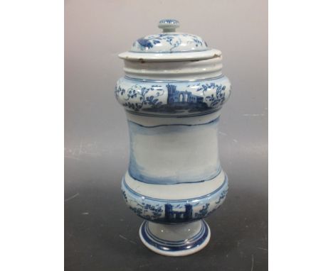 An Italian blue and white albarello and cover  