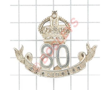 Indian Army. 80th Carnatic Infantry Officer’s cap badge circa 1903-22.A fine cast native silver example. Crowned “80” resting