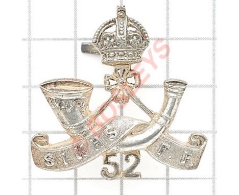 Indian Army. 52nd Sikhs Frontier Force Officer’s 1905 Birmingham hallmarked silver cap badge.Die-stamped crowned strung bugle