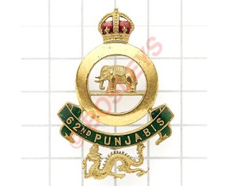 Indian Army. 62nd Punjabis Officer’s gilt and enamel cap badge circa 1903-22.Fine british made die-cast crowned quoit with el