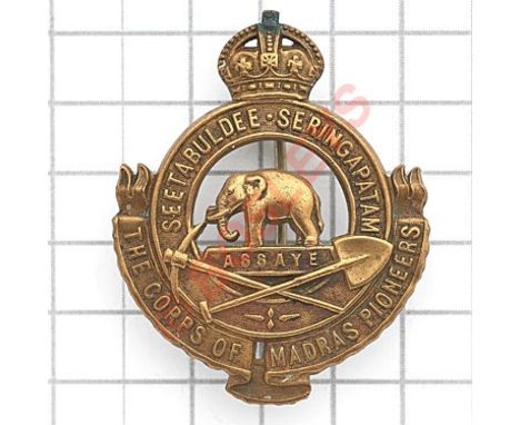 Indian Army. Corps of Madras Pioneers die-stamped brass pagri badge. British made crowned “Seetabuldee Seringapatam” with tit