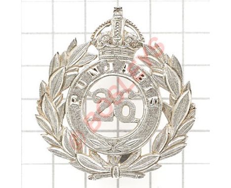 Indian Army. 26th Punjabis Officer’s pouch badge circa 1903-22.Well die-cast silvered example. Crowned laurel wreath, voided 