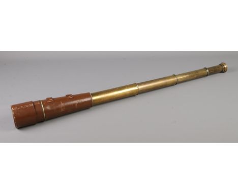A large four drawer brass and leather bound telescope, bearing makers engraving for Broadhurst Clarkson &amp; Co Ltd, 63 Farr