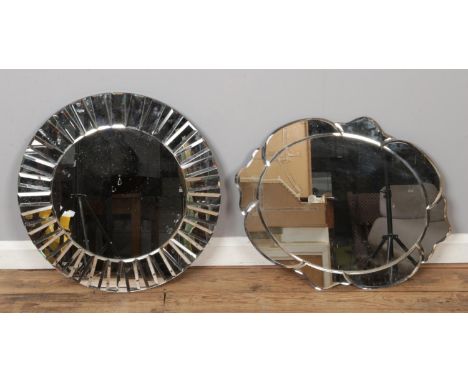 Two modern bevel edge wall mirrors.