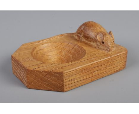 Robert 'Mouseman' Thompson, a carved oak pin dish, bearing signature mouse. Length: 10.5cm, Width: 7.5cm.