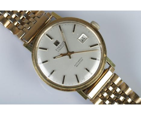 A Gents Tissot Seastar Automatic wristwatch. The silvered dial bearing baton markers and date display. On stainless steel str