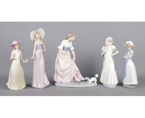 A collection of five Spanish Lladro Nao ceramic figures, to include: Let's Play 02001023 (H31cm), Dama Gallarda 292, Nina Dul