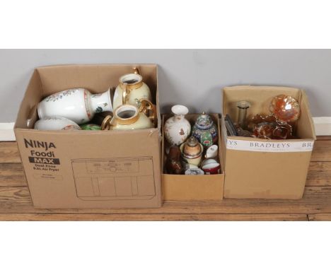 Three boxes of mixed ceramic and glassware, including coloured art glass, Carnival glassware, large two-handled rose vases (H