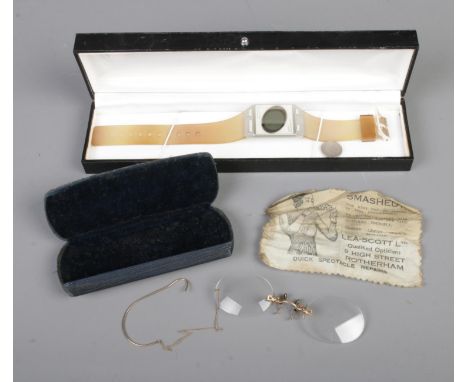 A Casio Illuminator wristwatch in gift box with a cased set of antique spectacles.