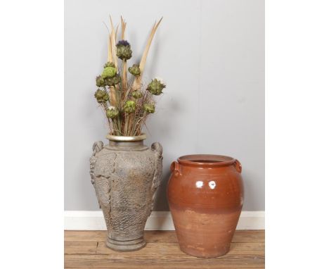 A pair of large ceramic vases, one ornate greyish vase with intricate detailing and handles, filled with dried flowers (H54cm