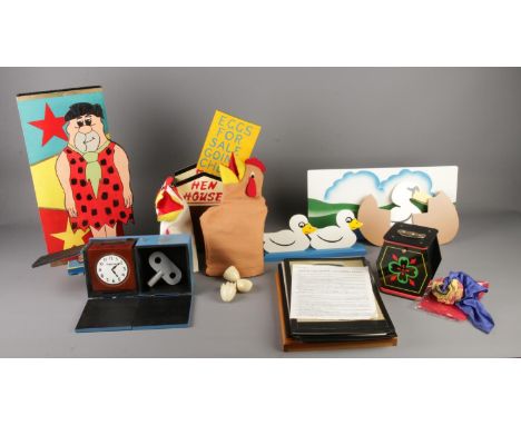 Ugly duckling trick, sucker clock trick (like the dice box), Fred Flintstone turn around trick, clatter box, hen house trick 