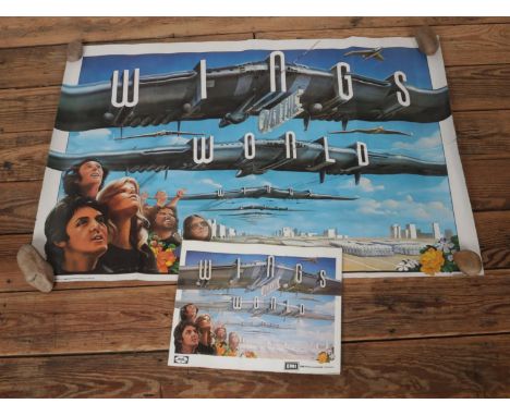 Wings Over the World 1979 advertising film poster along with an EMI brochure. Approx. poster dimensions 98.5cm x 69cm.