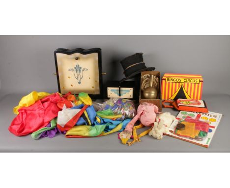 Silk frame and caddy, brass imp bottle, large quantity of silks, bingo circus trick, prop rabbit &amp; chicken and buttons tr