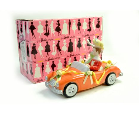 Mattel Barbie issue of an Austin Healey Clock Musical Car. Excellent in Box.