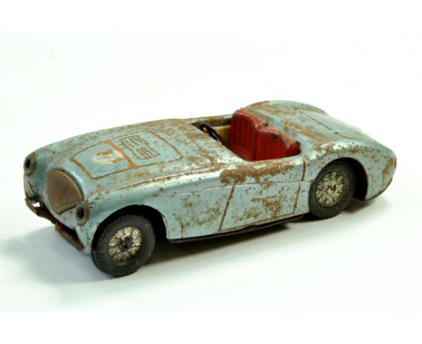 Minimodels Scalex tinplate Austin Healey in light blue, red seats, racing number 7. Some notable paint wear. Still a scarce i