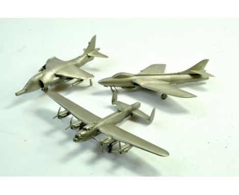 Trio of Pewter Aircraft, approx 1/72. Comprising Lancaster, Harrier and one other. Some light damage.