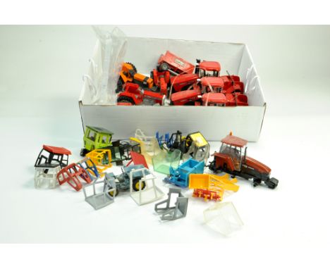 Interesting group of tractor spares and parts etc. Britains Cabs and other makers plus Quadtrac Chassis units. Ideal for conv