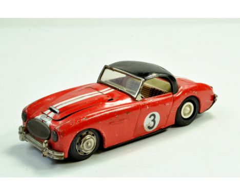 Joustra (France) Tinplate Model of an Austin Healey Hardtop racing number 3. Red example is generally good. Rare.