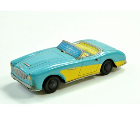 H TOYS JAPAN Tinplate Model of an Austin Healey in light blue. Generally good to very good.