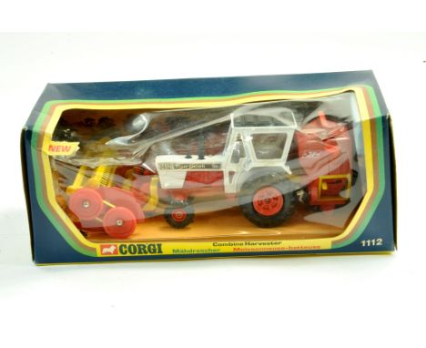 Corgi No. 1112 David Brown 1412 Tractor with JF Combine Attachment. Toy appears excellent in good box, cellophane slightly to