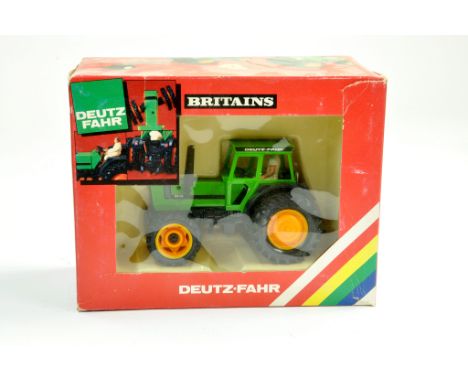 Britains Farm 1/32 Deutz DX92 Tractor with dual wheels. Generally Excellent in fair to good (slightly grubby / dusty) box.