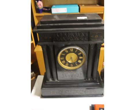 A LARGE SLATE MANTLE CLOCK