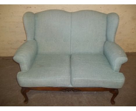 AN ANTIQUE 2 SEATER SOFA WITH GABMOCE SUPPORT