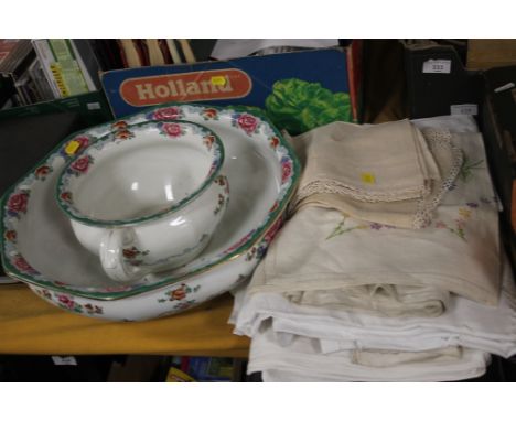 A CERAMIC WASH BOWL AND CHAMBER POT TOGETHER WITH A COLLECTION OF ASSORTED LINEN 