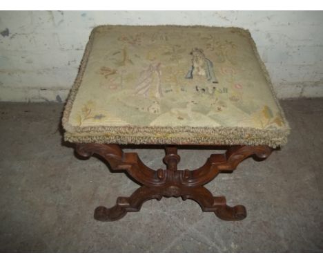 AN ANTIQUE 19TH CENTURY CROSS FRAMED TAPESTRY STOOL