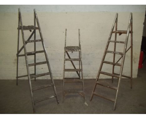 THREE PAIRS OF STEP LADDERS