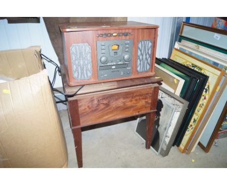 An Akura compact disc and record player and a commode