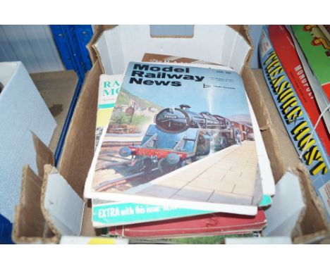 A box of model railway related magazines