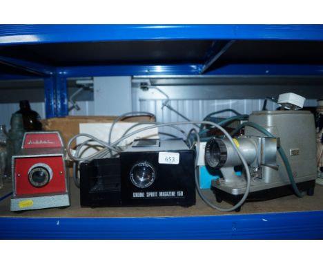 A Prinz 300 projector; a Alphax projector and Gnome projector