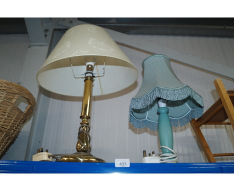 A brass table lamp and a wooden table lamp