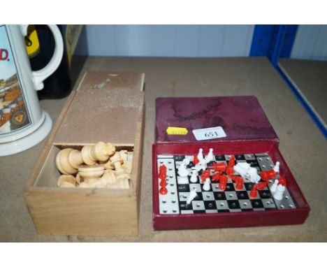 A box of wooden chess pieces, height of King approx. 6½cm and a travelling chess set